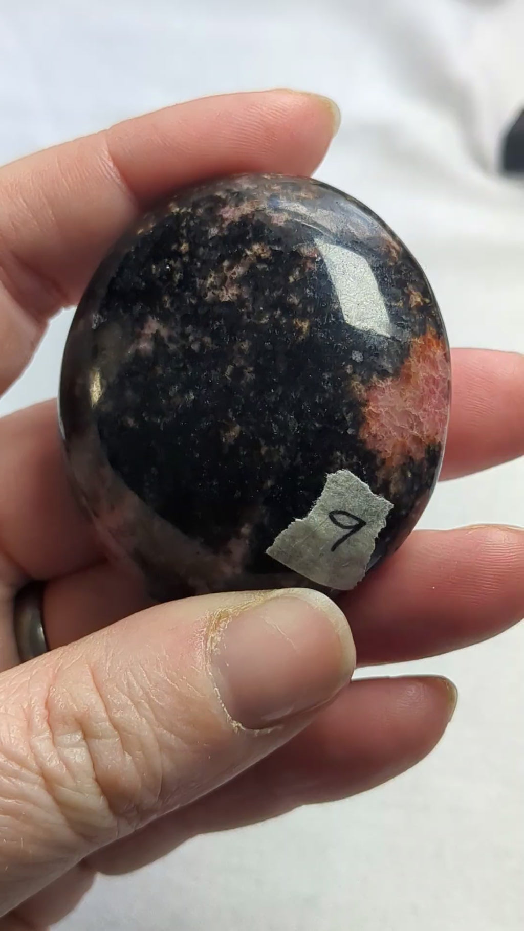 Rhodonite palm stone