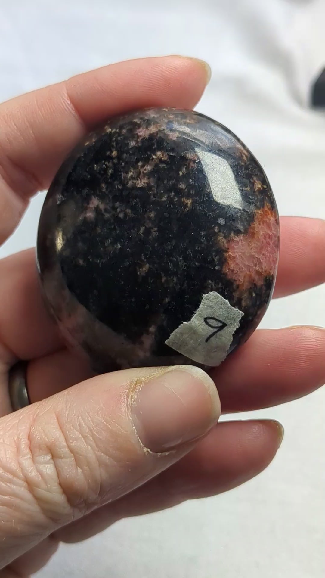Rhodonite palm stone