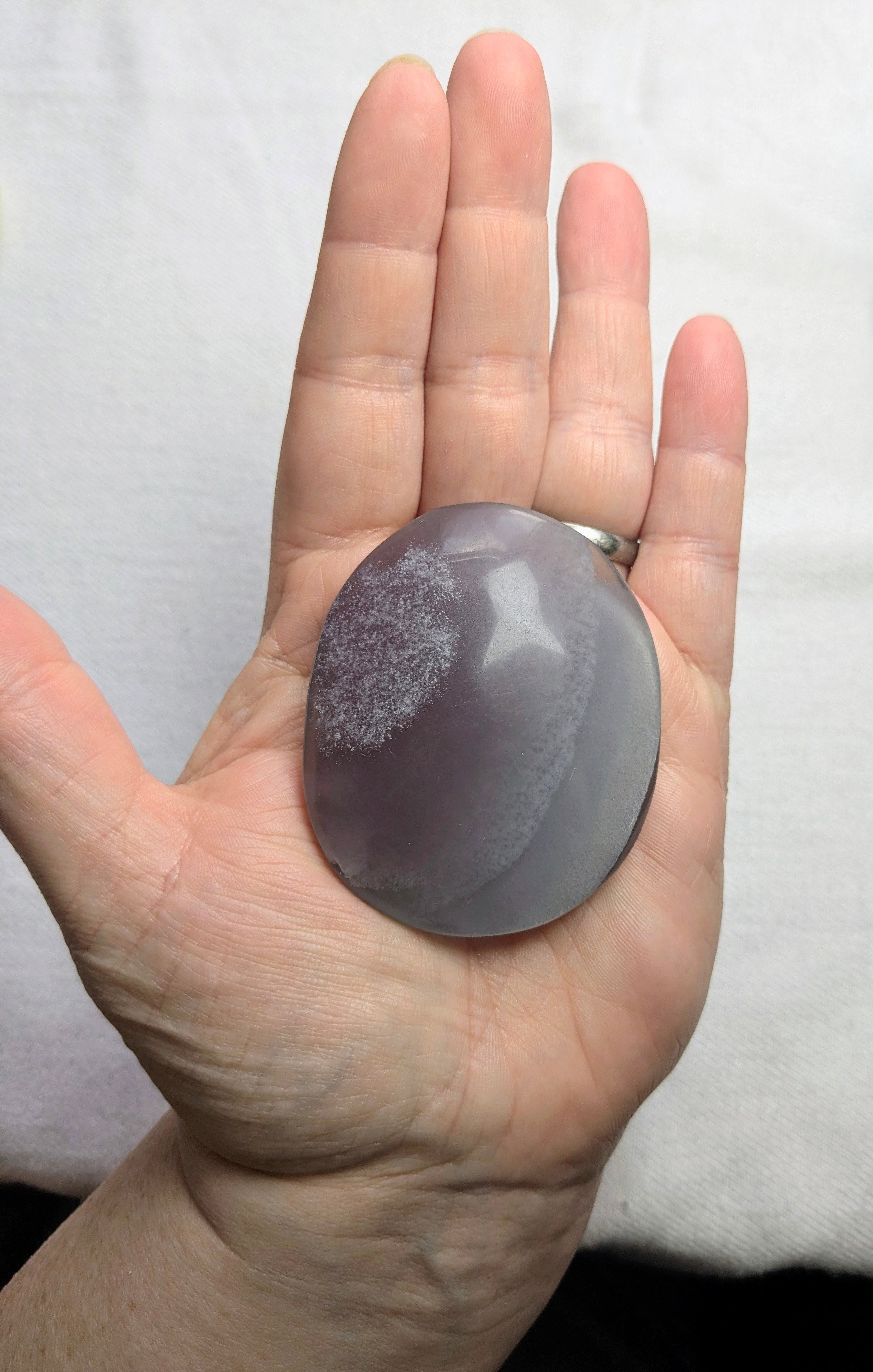 Purple fluorite palm stone