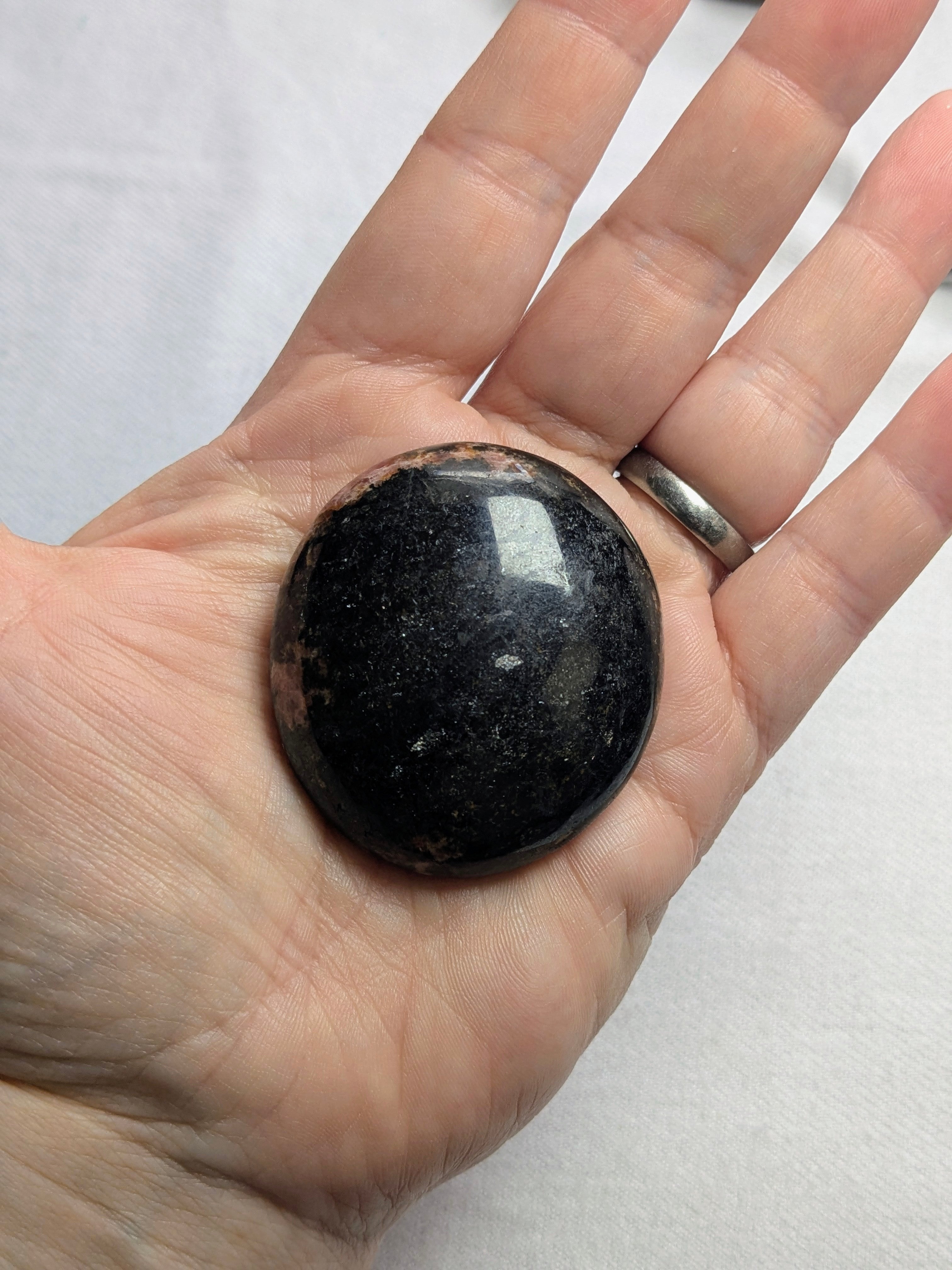 Rhodonite palm stone