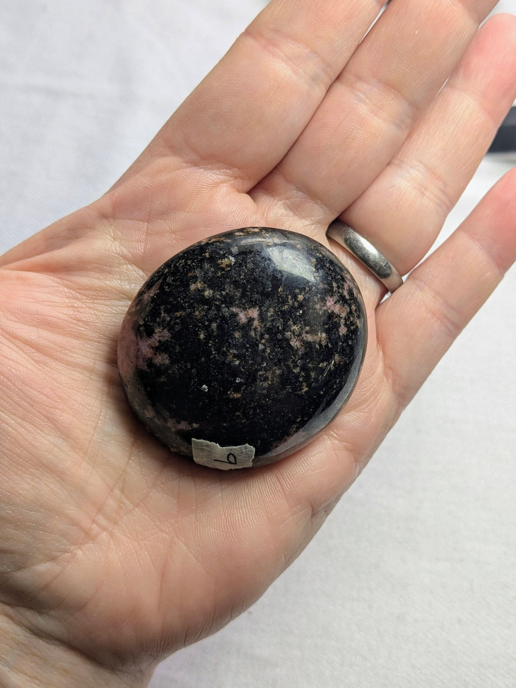 Rhodonite palm stone